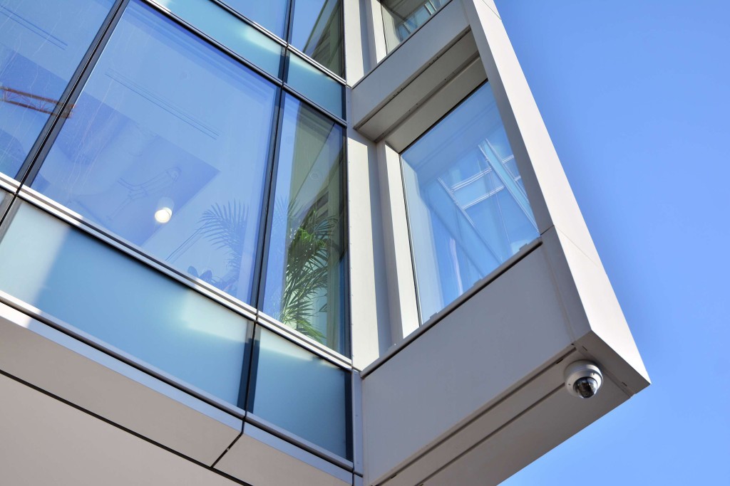 Point-Supported Glass Curtain Wall Systems for Iconic Architectural Designs